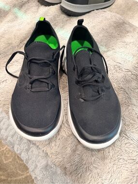OOFOS Black Slip-On Sneakers with Bright Green Insole and White Midsole